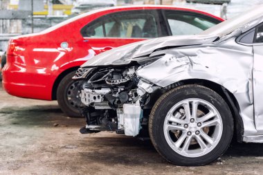 Many wrecked car after traffic accident crash at restore service maintenance station garage indoor. Insurance salvage vehicle auction wholesale storage. Auto body wreck damage work workshop center clipart