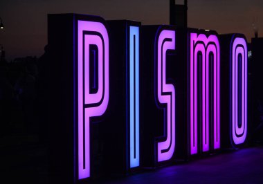 Seven Foot tall letters on the Pismo Beach Pier Plaza. Pismo beach is on the Pacific Ocean in San Luis Obispo County, California clipart