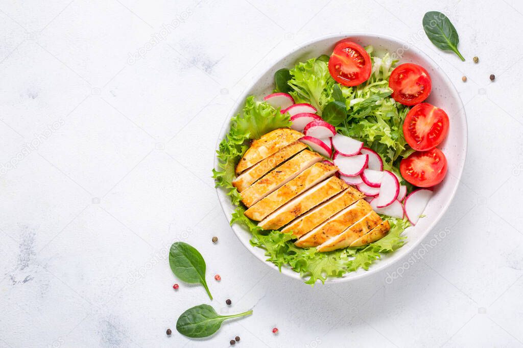 Salad with Chicken fillet. Keto diet, healthy food, diet lunch. Top view on white background.