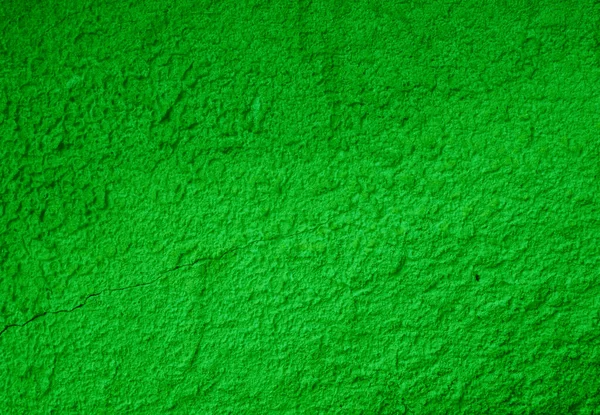 Зеленая пилинг падающая краска на штукатурке. — стоковое фото