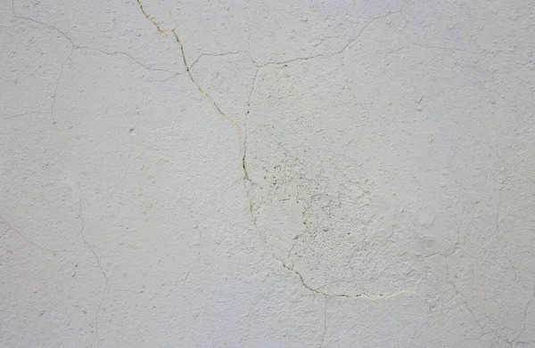 Textura starého šedého štuku na betonové stěně. — Stock fotografie