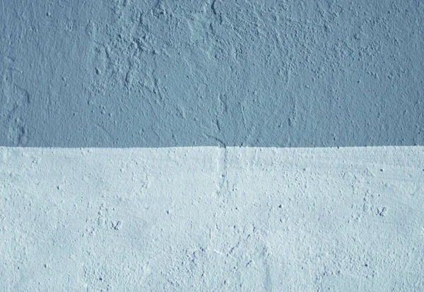 The wall is made of blue and light blue plaster. —  Fotos de Stock