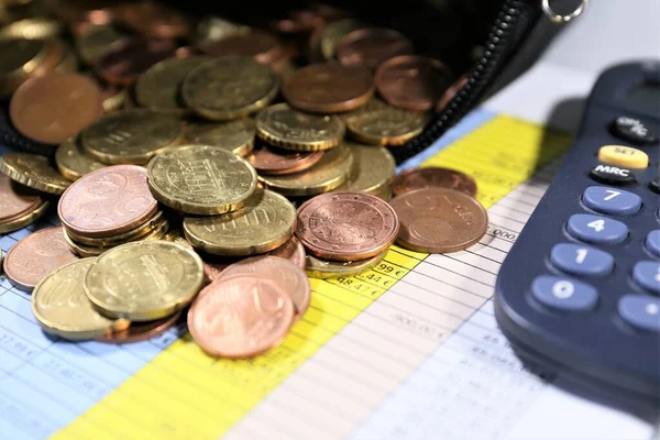 Bozuk paralar ve hesap makinesi parası