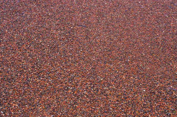 Sabbia rossa sulla spiaggia di Santorini, Grecia — Foto Stock