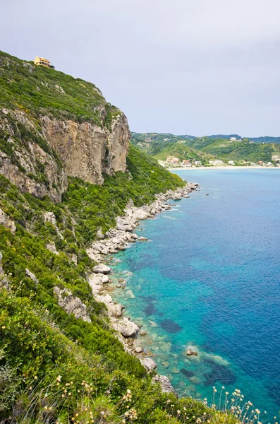 Lagoon and high cliffs near Agios Georgios, Corfu, Greece — Stock Photo, Image
