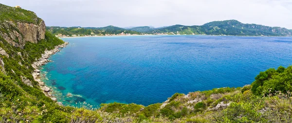 Lagoon and high cliffs near Agios Georgios, Corfu, Greece — Stock Photo, Image