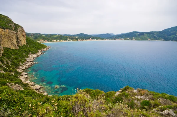 Lagoon and high cliffs near Agios Georgios, Corfu, Greece — Stock Photo, Image