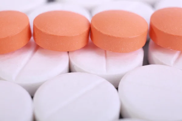 Rode en witte pil capsules stapel — Stockfoto