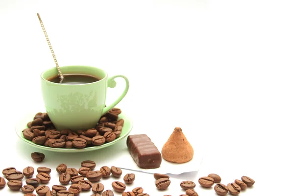 Coffee cup and saucer on a wooden table. Dark background. — Stock Photo, Image