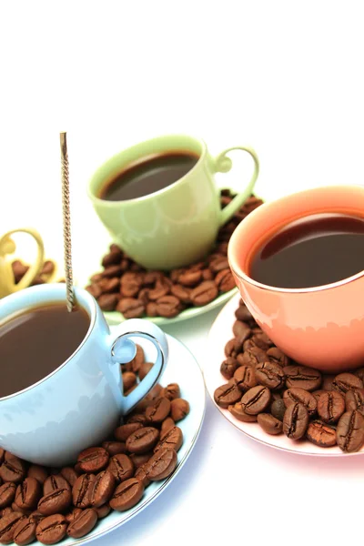 Coffee cup and saucer on a wooden table. Dark background. — Stock Photo, Image