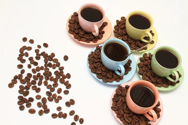 Coffee cup and saucer on a wooden table. Dark background. — Stock Photo, Image