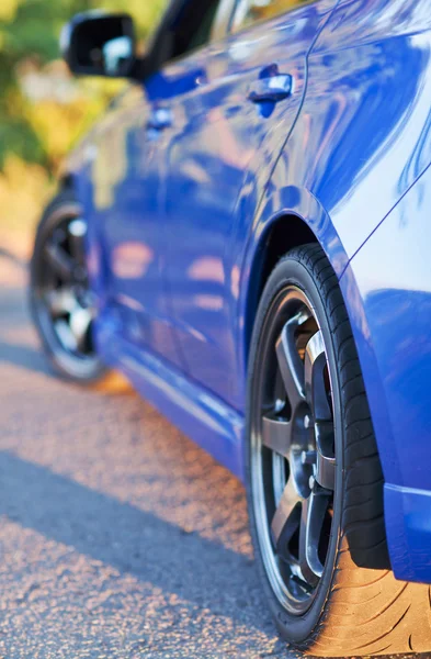 Front side view of blue sport car — Stock Photo, Image