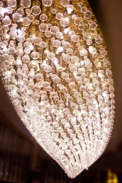 Large modern chandelier in hotel lobby — Stock Photo, Image