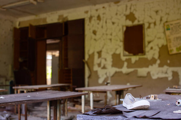 Ruins of a classroom at a school in the Chernobyl zone.