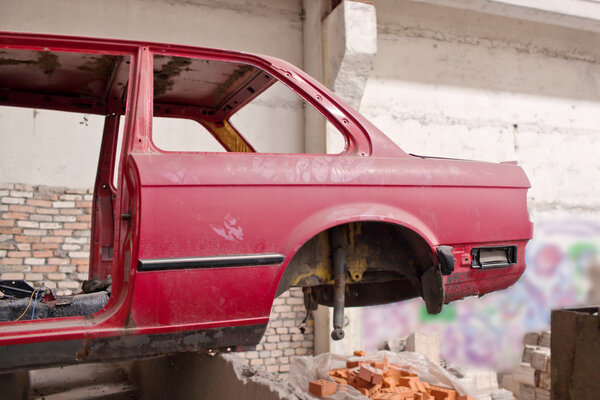 Back side of the crashed red car