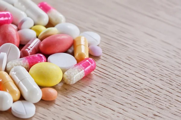 Multicoloured pills and capsules — Stock Photo, Image