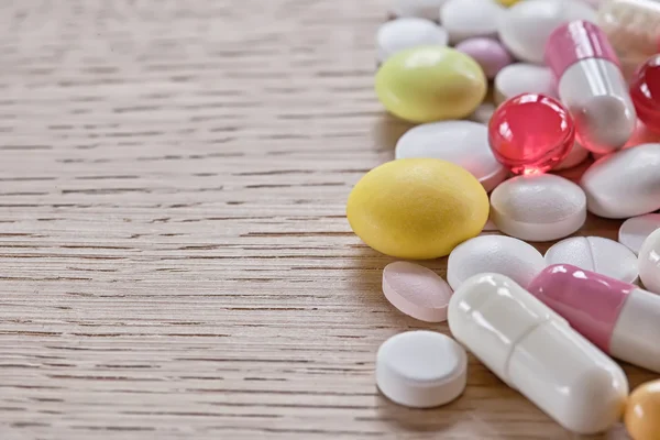 Multicoloured pills and capsules Royalty Free Stock Images