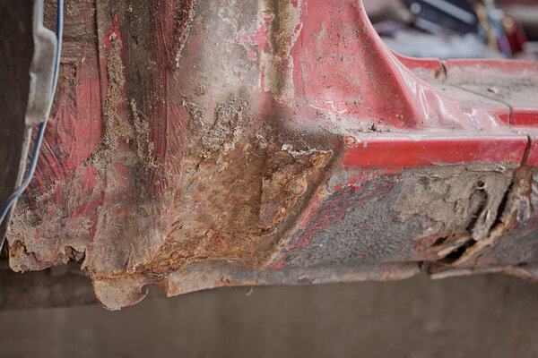 Close-up photo of element rusty car 