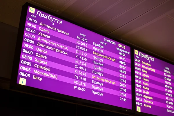 Відображати відомості про виїзд літака українською мовою — стокове фото
