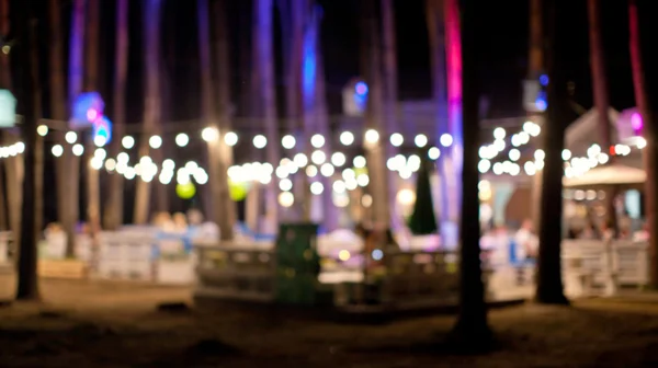 Outdoor cafe in the evening. Blurred photo — Stock Photo, Image