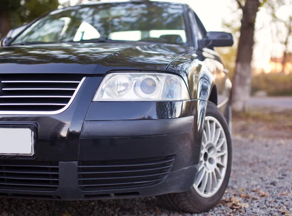 Headlights of the black car close-up photo — Stock Photo, Image