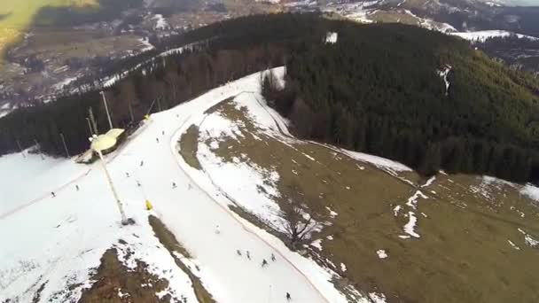 Aerial shot of downhill skiing in the ski resort of Bukovel — Stock Video