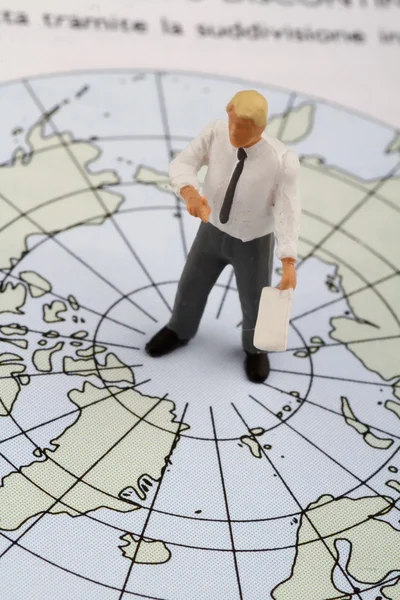 Figurina in miniatura di un insegnante di geografia — Foto Stock