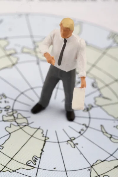 Figurina in miniatura di un insegnante di geografia — Foto Stock