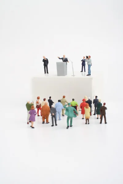 Miniature figurine of a politician speaking to the crowd during an election — Stock Photo, Image