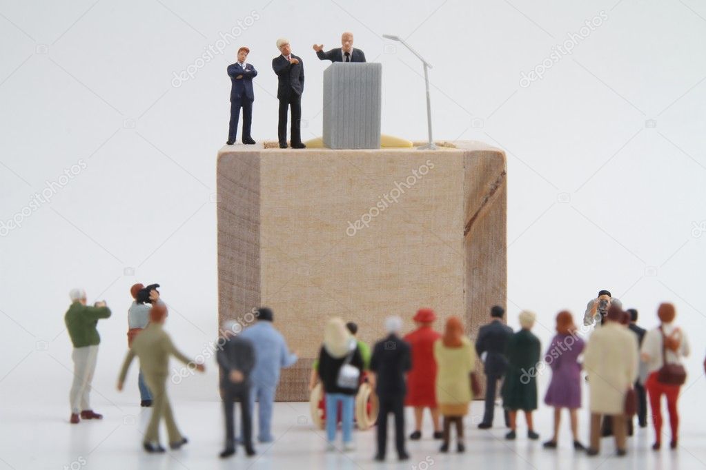 miniature figurine of a politician speaking to the crowd during an election