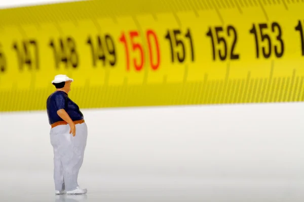 측정기-미니어처에 뚱뚱한 남자 — 스톡 사진