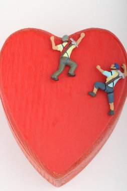 miniature of climbers scaling a red heart clipart