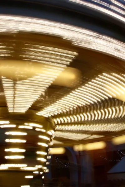 Carousel lights motion in the night — Stock Photo, Image