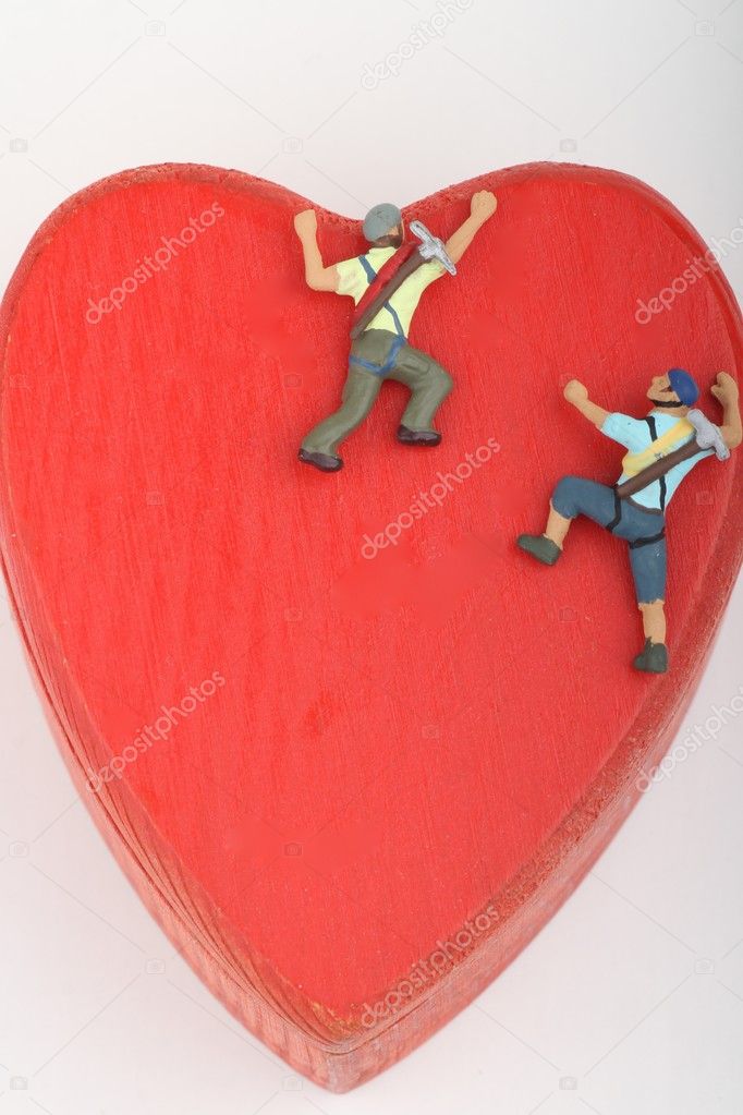 miniature of climbers scaling a red heart