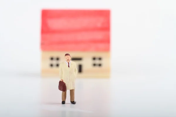 Miniature concept of real estate negotiation — Stock Photo, Image