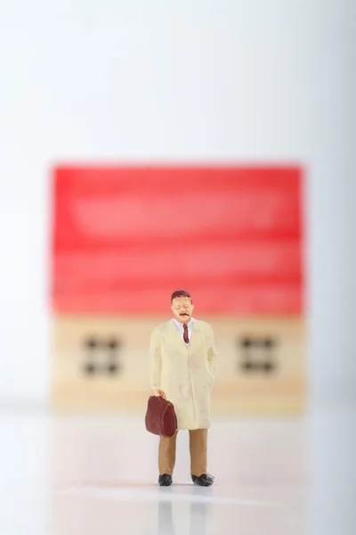 Miniature concept of real estate negotiation — Stock Photo, Image