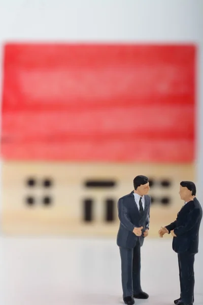 Miniature concept of real estate negotiation — Stock Photo, Image