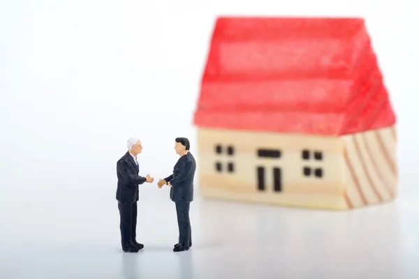 Miniature concept of real estate negotiation — Stock Photo, Image