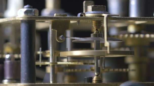 Close-up of a vintage clock mechanism running — Stock Video