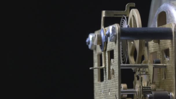 Close-up of a vintage clock mechanism running — Stock Video