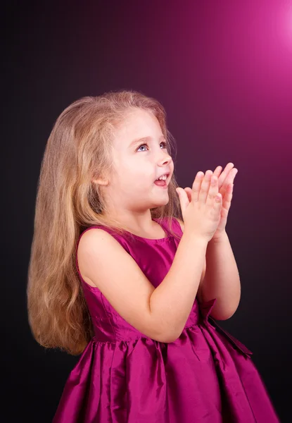 Little cute girl in a pink dress — Stock Photo, Image