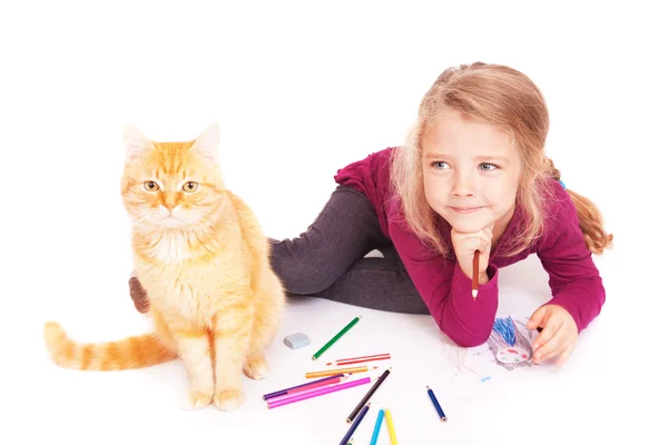 Little cute girl with colored pencils and red cat lying on the floor — Stock Photo, Image