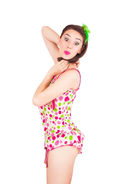 Portret van mooie jonge brunette vrouw in kleurrijke pyjama — Stockfoto
