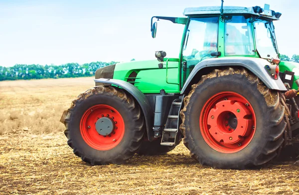 Rural landscape with a tractor — Stock Photo, Image