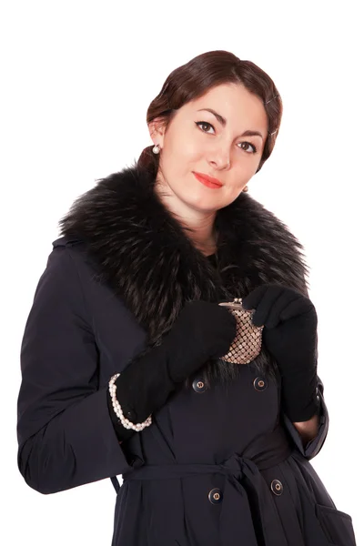 Meisje in een zwarte jas bedrijf portemonnee — Stockfoto