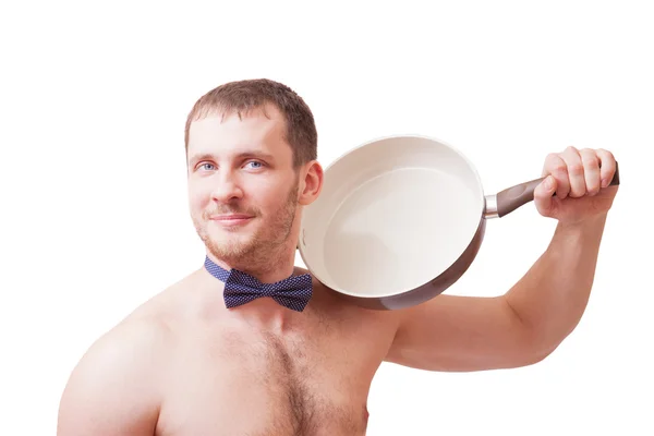 Привлекательный мужчина держит сковородку — стоковое фото