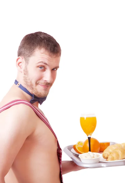 Hombre divertido en un delantal con desayuno —  Fotos de Stock