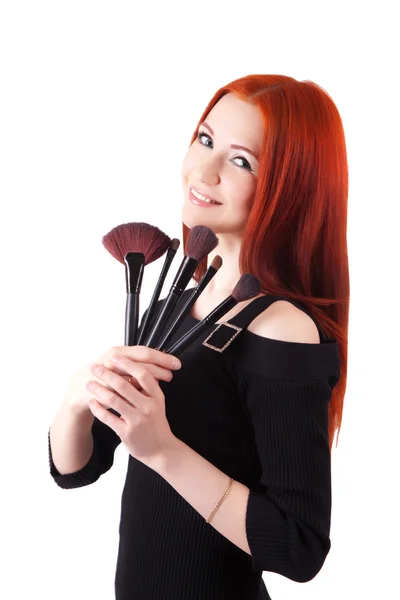 Chica artista de maquillaje con cepillos — Foto de Stock