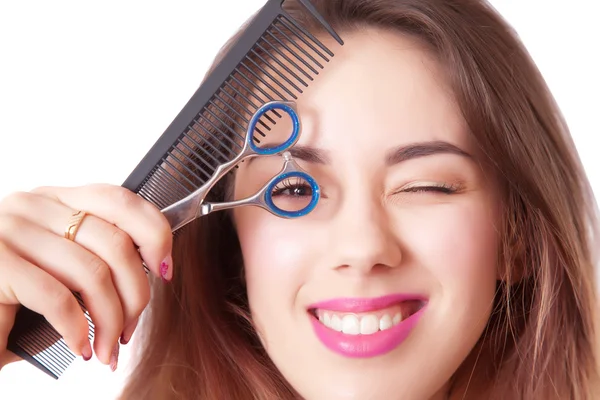 Girl hairdresser with scissors and comb closeup — Stock Photo, Image