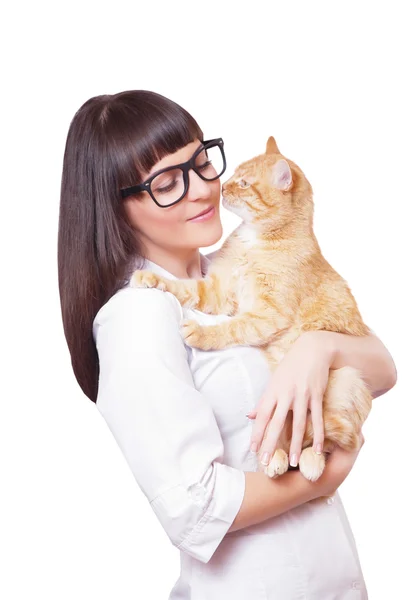 Portrait of a beautiful woman holding red cat Stock Picture